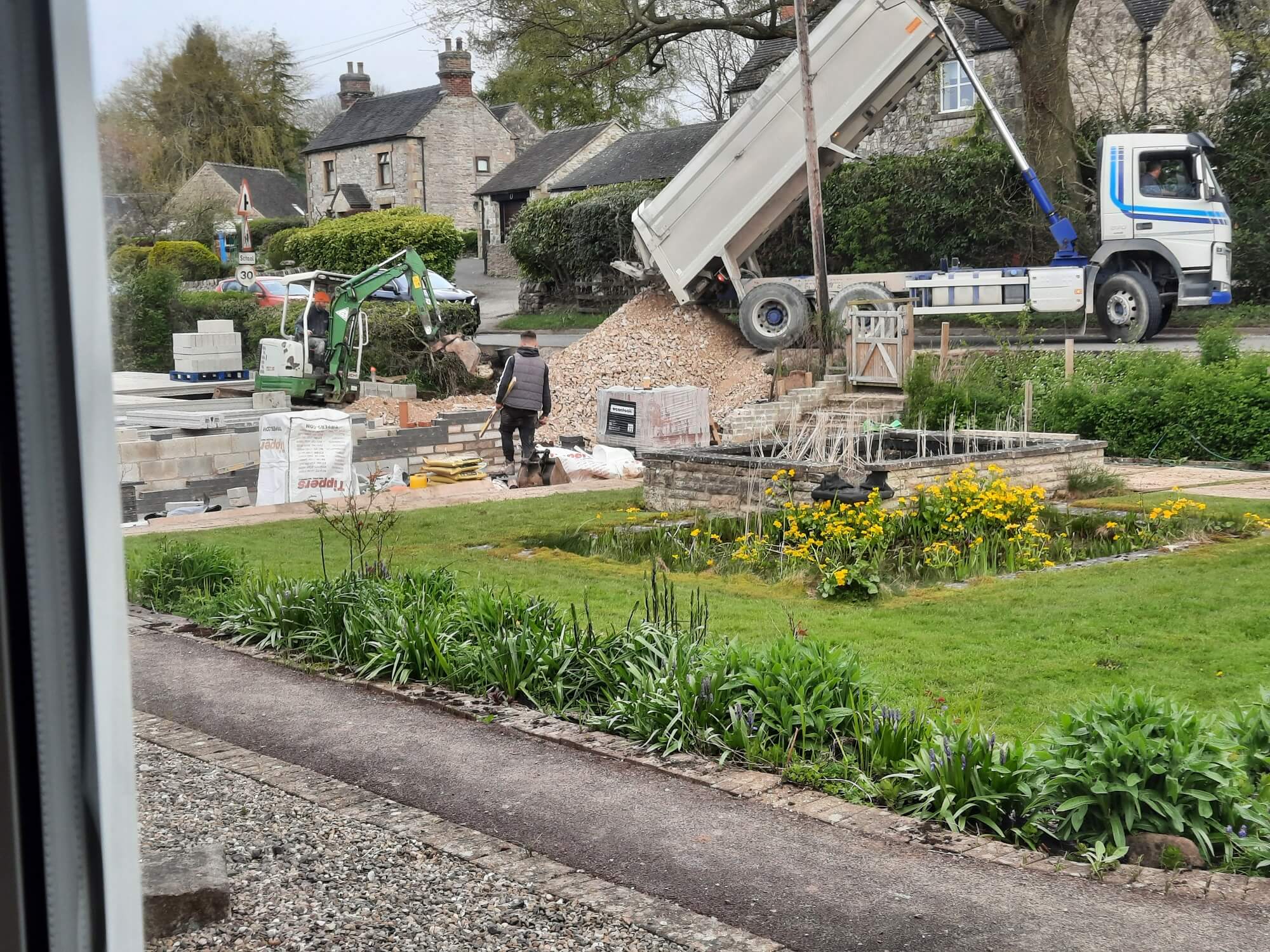 Tiping 4th 20 ton load of stone