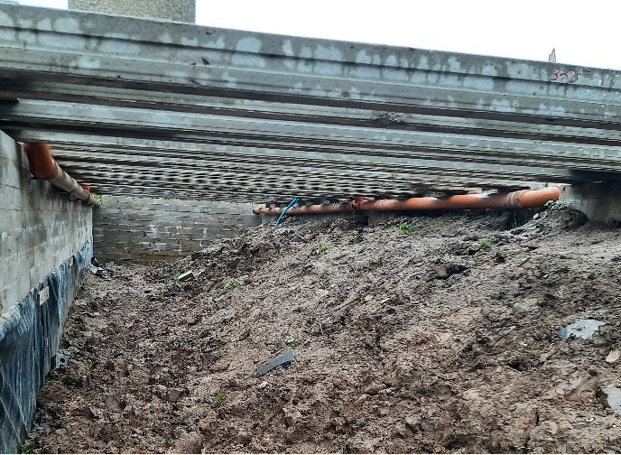 Drain go under parking area